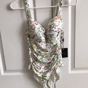 Woman’s Nip Tuck one piece swimsuit size 8